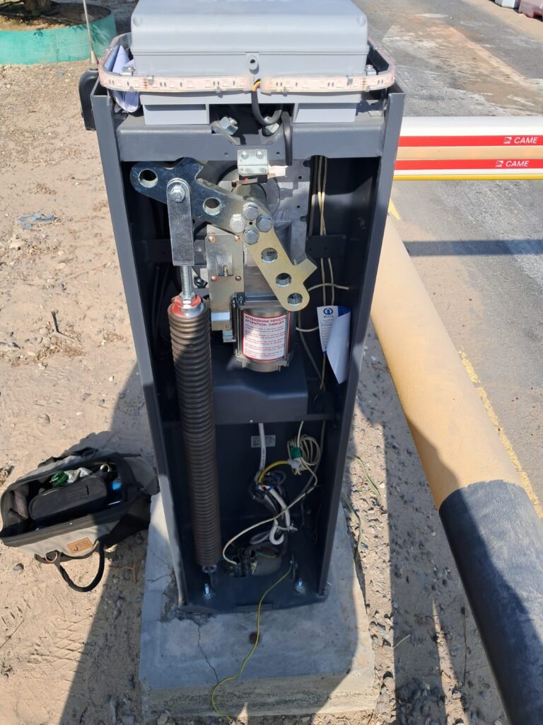 barrier gate motor and gearbox components inside automatic barrier system