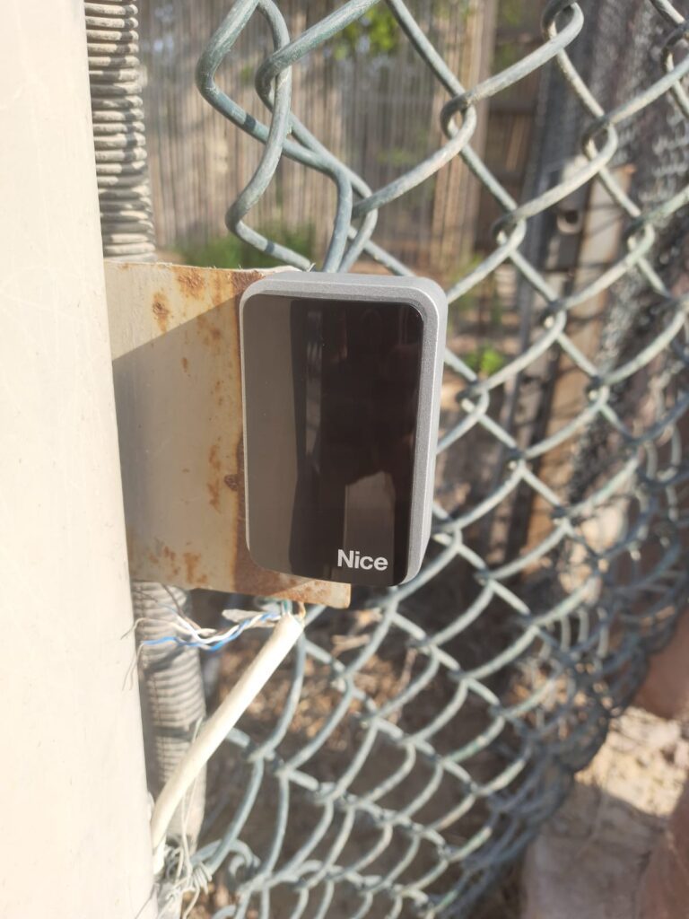 barrier gate photocell safety sensor installed in parking system Dubai